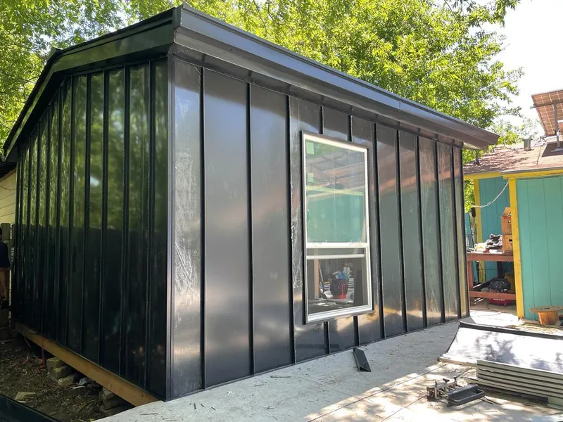 Black standing seam metal wall panels for Metal Roof Installation in Loves Park