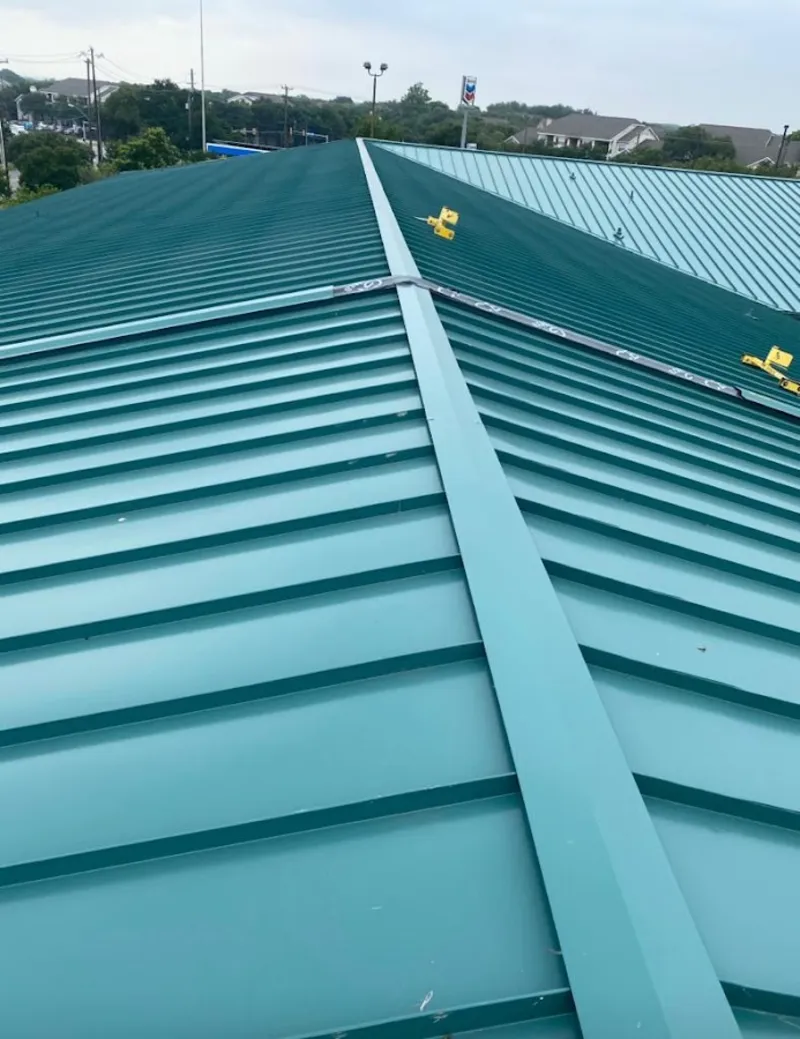 Green commercial metal roof ridge and valley for Metal Roof Repair in Loves Park