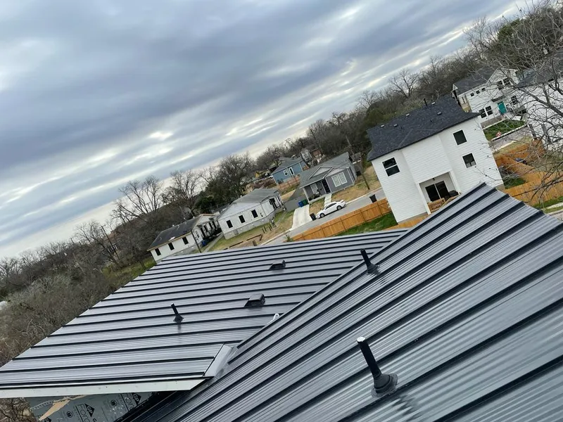 Standing seam metal roof panels with vents for Skylight Repair in Loves Park